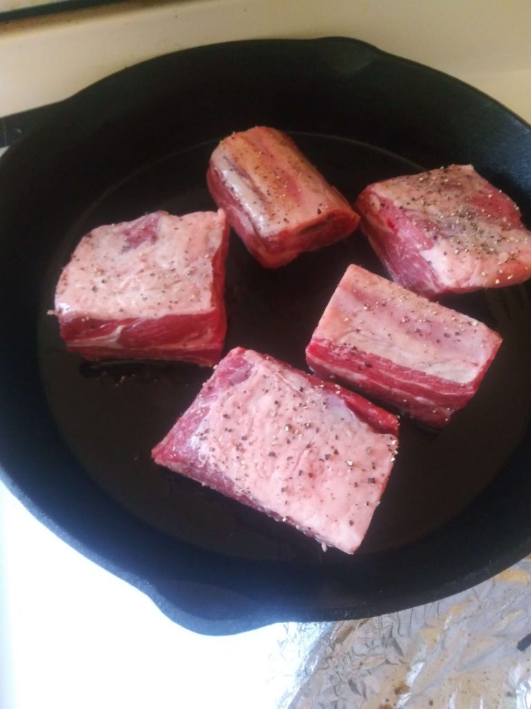 beef short ribs in cast iron skillet